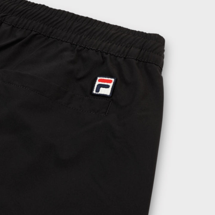 FILA High Tide Relaxed 4-way Stretch Trousers In Black