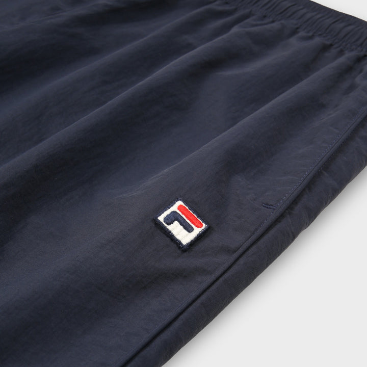 FILA Collalbo Relaxed Woven Track pants I Dark Sapphire