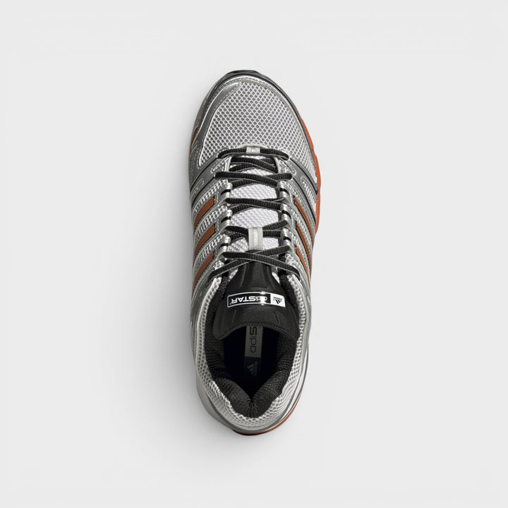 Adidas Adistar Control 5 sneakers i sølv og orange.
