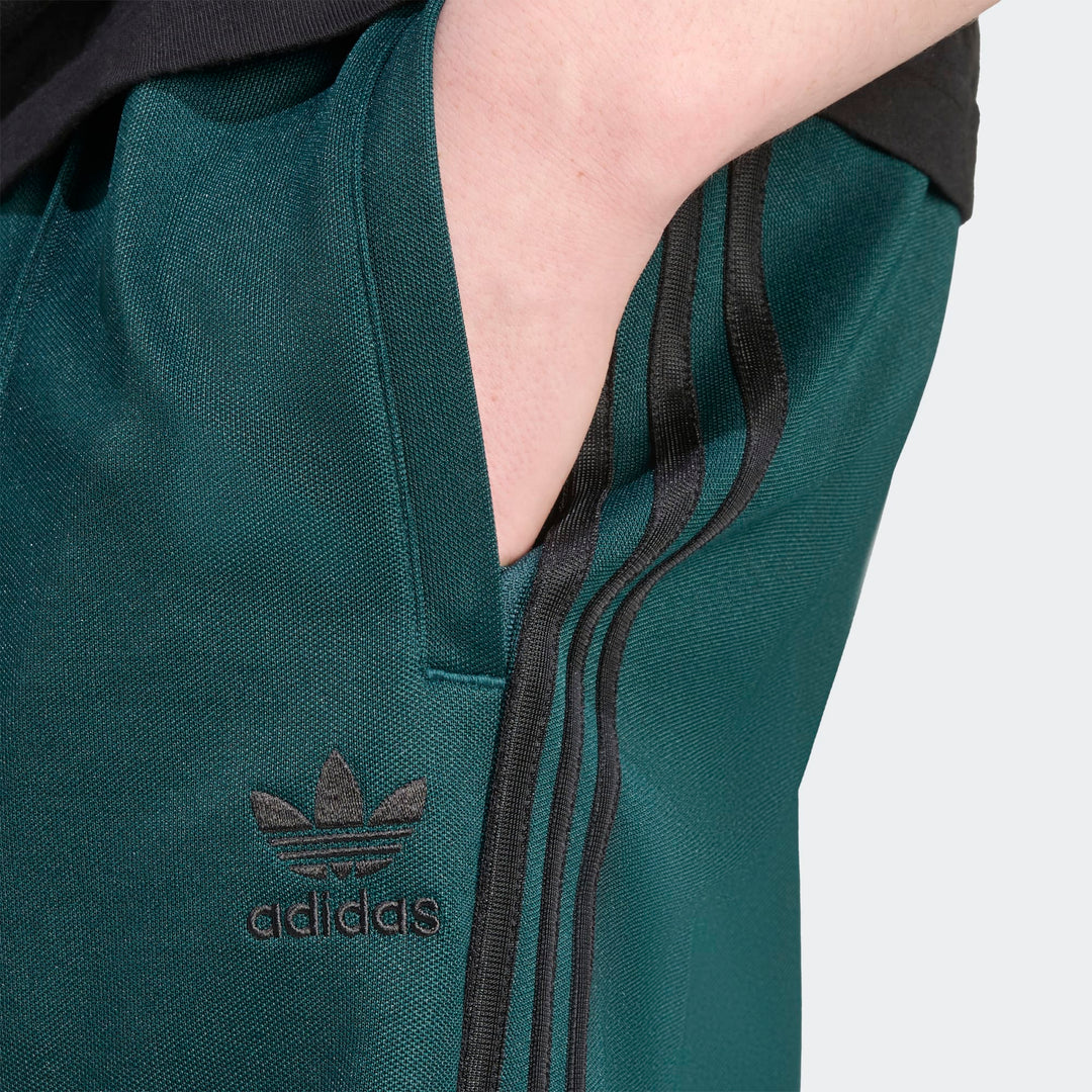Adidas Firebird Baggy Track Pants i Aurora Ivy/Black med Trefoil-logo