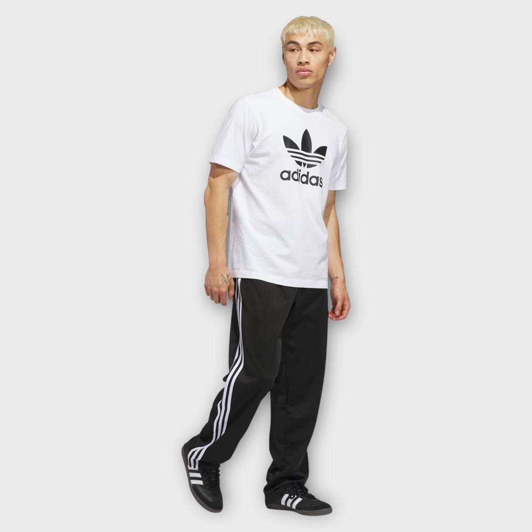 Detaljebillede af Adidas Firebird trackpants i black white