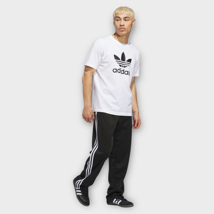 Detaljebillede af Adidas Firebird trackpants i black white