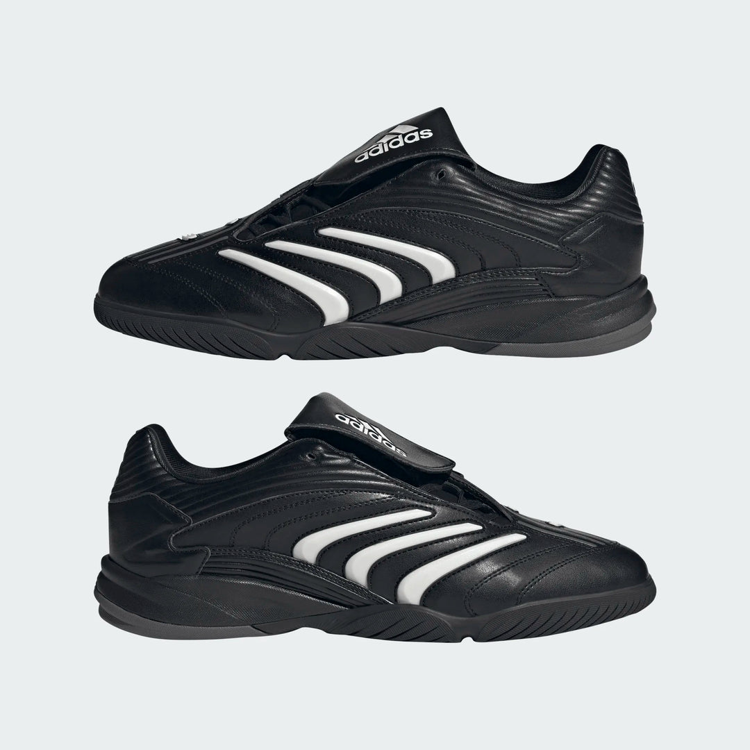 Et par Adidas Predator Sala i sort med skoenes inder- og yderside vist over hinanden.