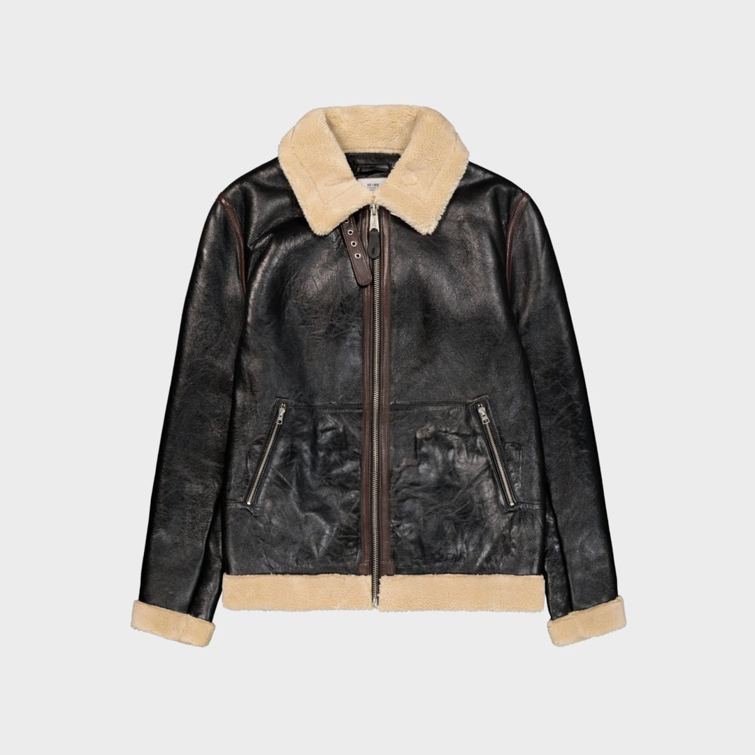 Alpha Industries USAAF Type D-1 læderjakke i sort set forfra med beige krave og to lynlåslommer.