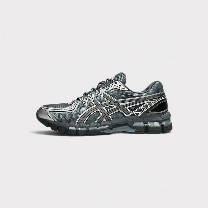 Asics GEL-Kayano 20 i Carrier Grey/Carbon – set fra indersiden med lagdelte paneler og ASICS-striber