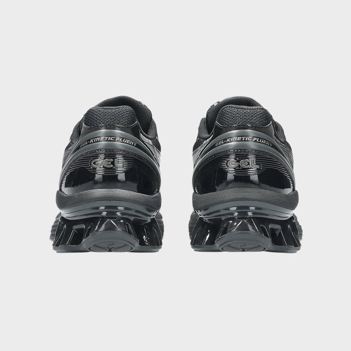 Ydersål på ASICS SportStyle Gel-Kinetic Fluent i Black og Graphite Grey med støddæmpende og slidstærk konstruktion.