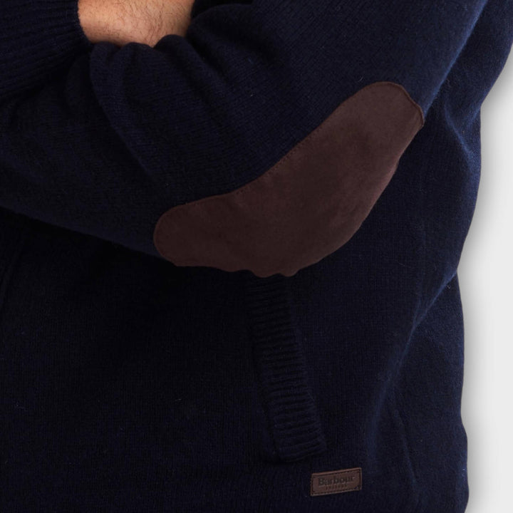 Close-up af lynlåslukning og Barbour-logo på Patch Zip Through i Navy