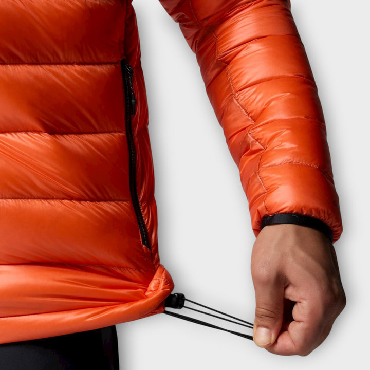 Lynlåslukning og lommer på Columbia Arctic Crest Down Hooded Jacket i Zing/Orange.