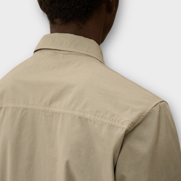 C.P. Company overshirt grey med ring-lomme på ærmet.