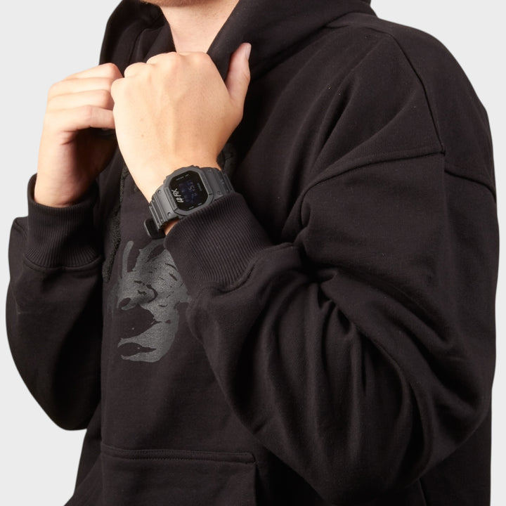 Model wearing G-SHOCK x Le Fix watch in lifestyle setting