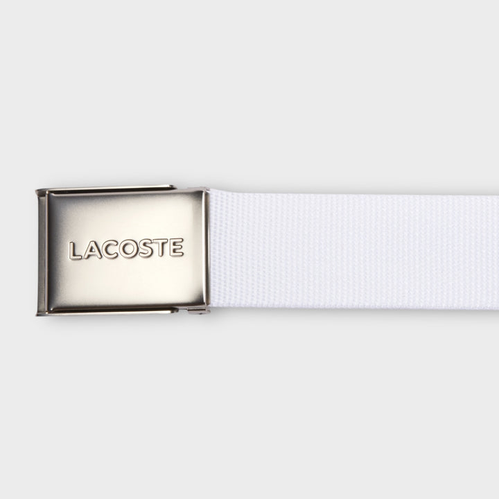 Lacoste French Made Belt i Bright White set bagfra med enkel og tidløs finish.