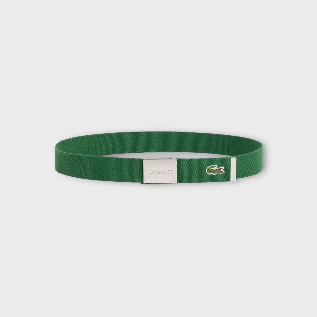 Nærbillede af materialet på Lacoste French Made Belt i grøn med slidstærk overflade.