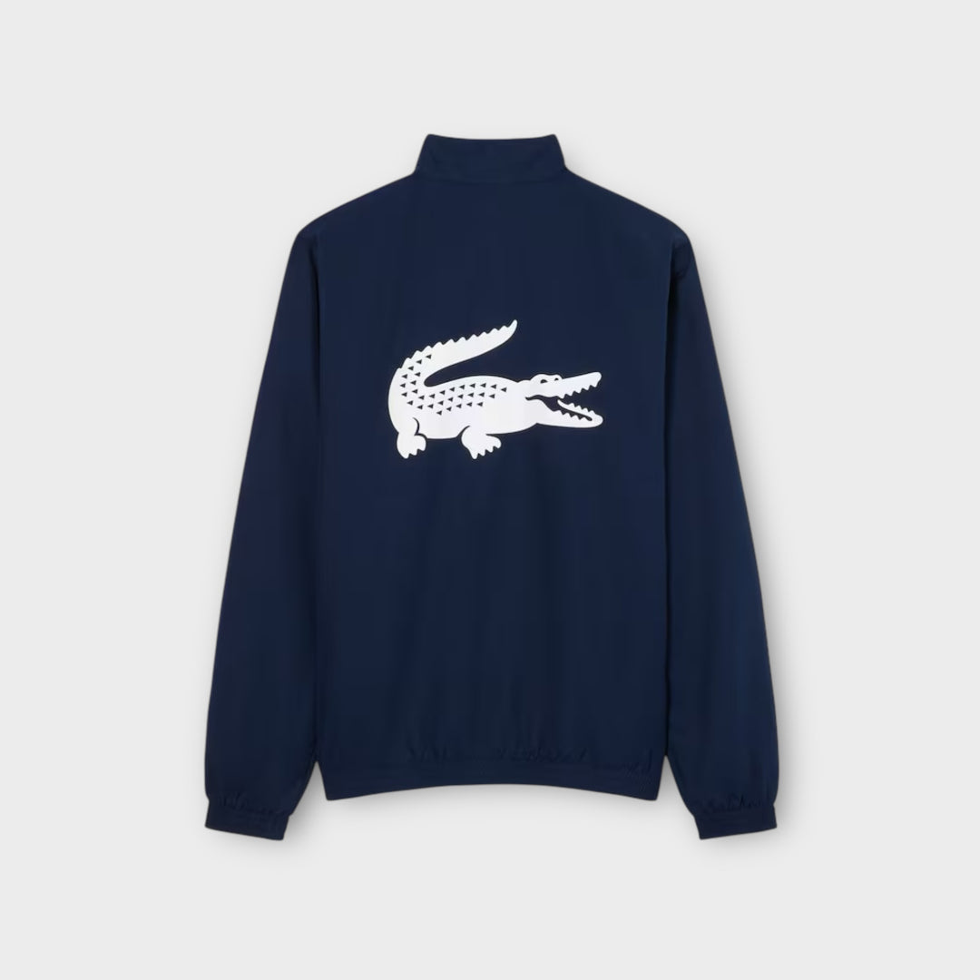 Nærbillede af materialet på Lacoste Sport Printed Tracksuit i navy blå og hvid med let og komfortabel kvalitet.