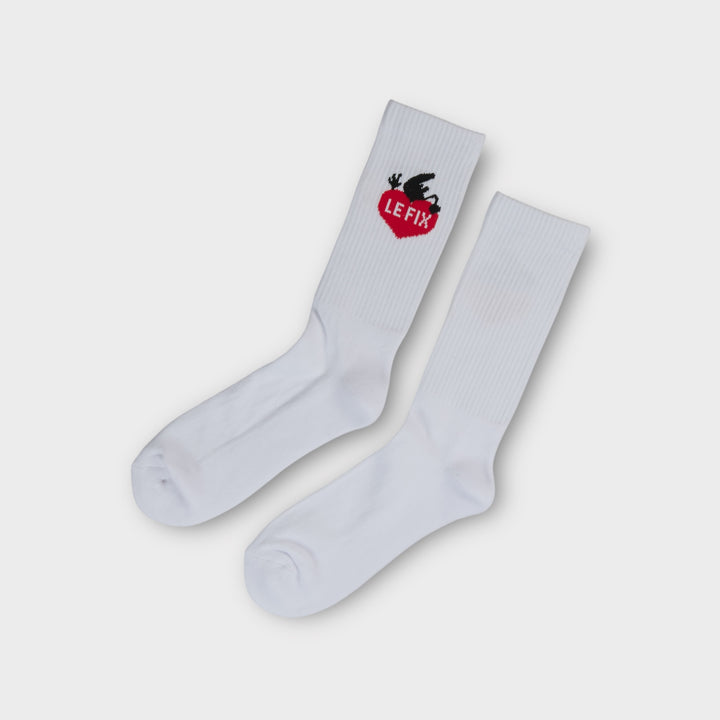 Hvide Le Fix Kaj Lover tennis sokker med rødt hjerte og sort Kaj-motiv.