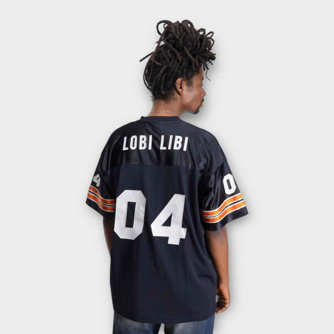 Broderet og printet Patta logo på brystet på blå jersey