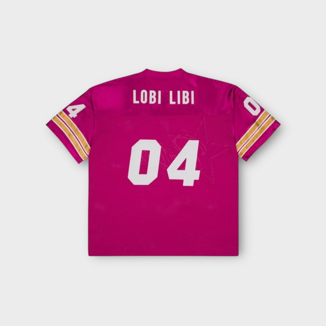 Sideprofil af Patta All Star Football Jersey i pink