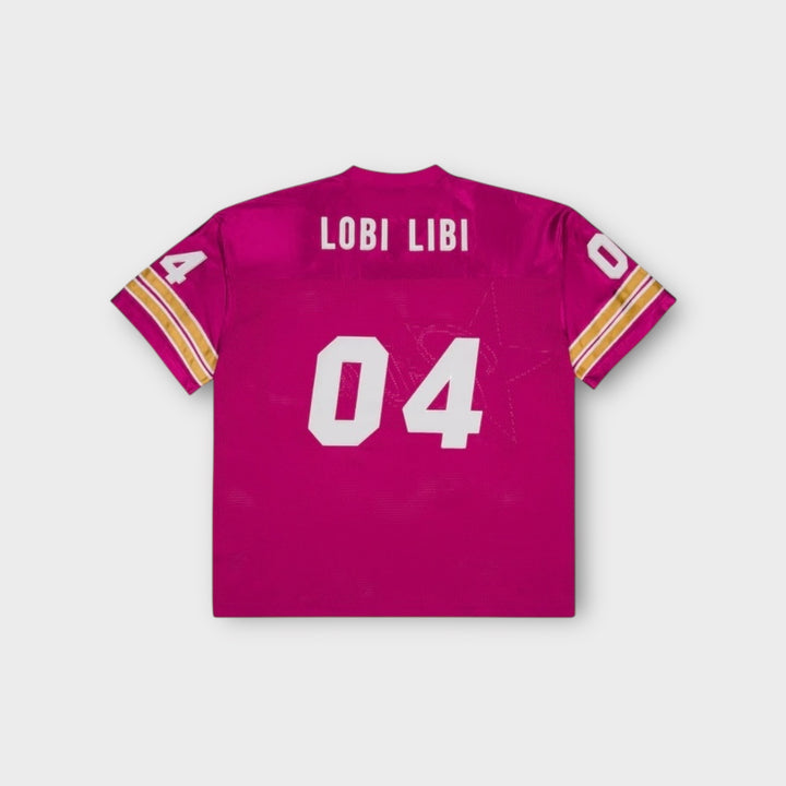 Sideprofil af Patta All Star Football Jersey i pink