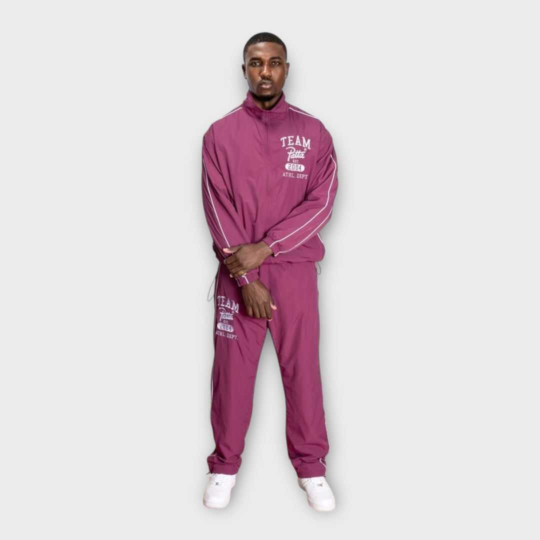 Patta Athletic Nylon Track Jakke i pink set bagfra