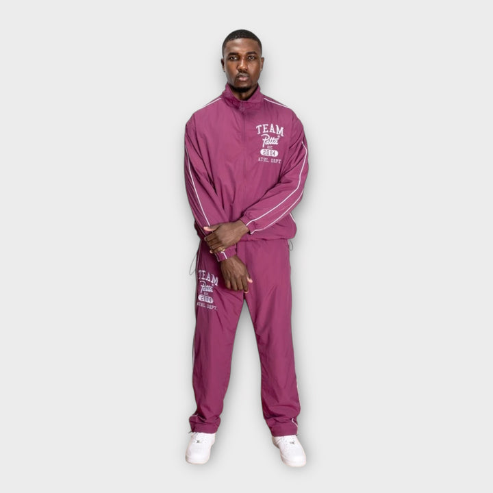 Patta Athletic Nylon Track Jakke i pink set bagfra