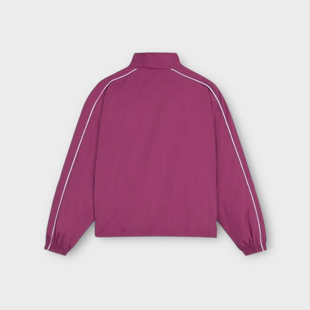 Lynlåslukning detalje på Patta Athletic Nylon Track Jakke