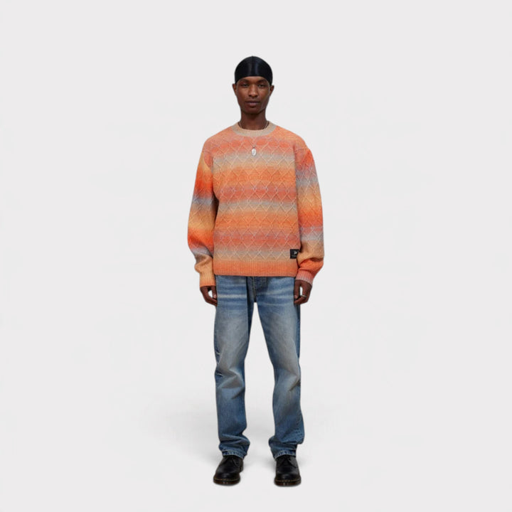 Patta Space Dye Cable Knitted Sweater i Multi vist forfra på model