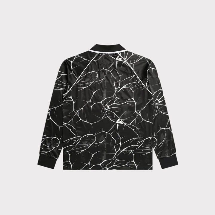 Patta Thorns Longsleeve Football Jersey vist forfra på model med Patta-logo og brystbadge