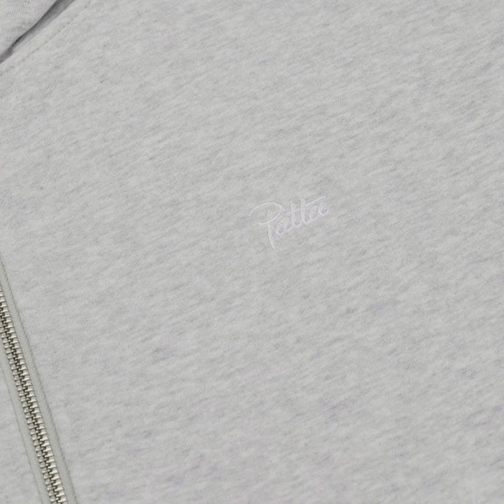 Close-up af waffle-strukturen på Patta Reversible Zip Up Hooded Sweater i Grey