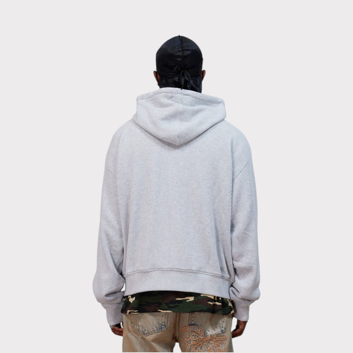 Patta Waffle Reversible Zip Up Hooded Sweater i Grey vist fra siden på model