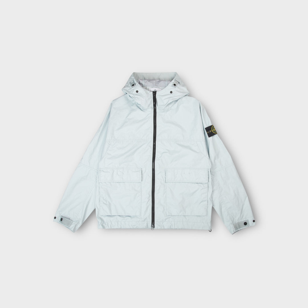 Stone Island Membrana 3L TC Hooded Jacket i Sky Blue set forfra med teknisk design.