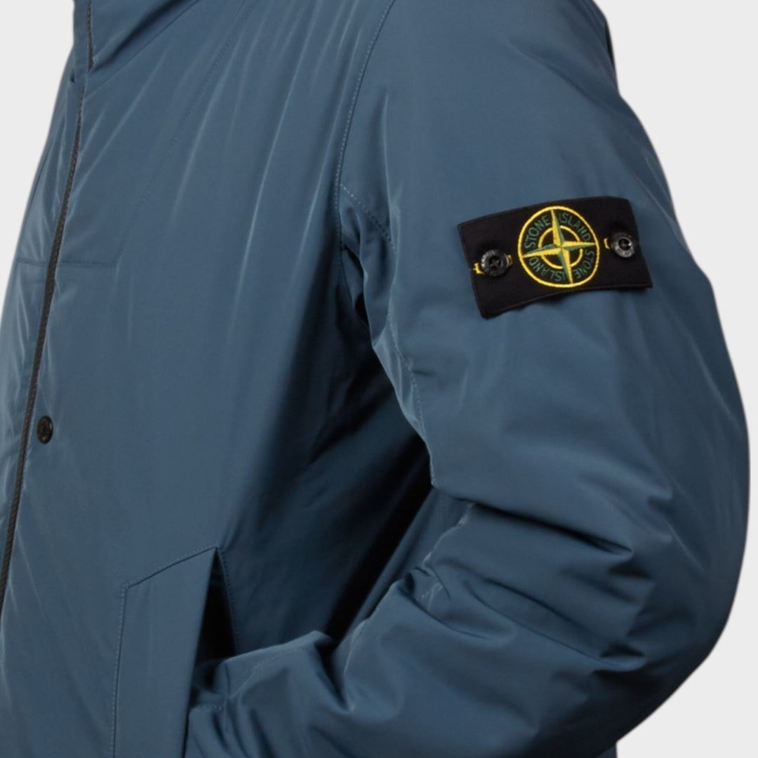 Blå Stone Island herrejakke med kompasbadge