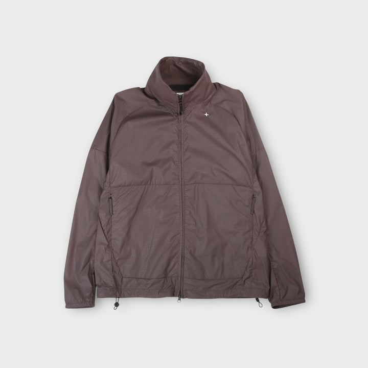Stone Island Stellina Light Stretch Nylon Jacket i Grey set forfra med teknisk og minimalistisk design.