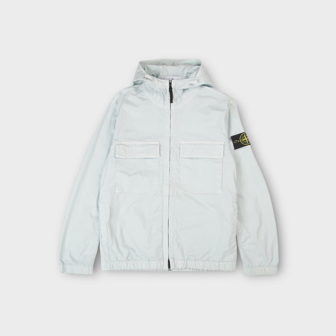 Stone Island Stretch Organic Cotton Twill Hooded Jacket i Sky Blue set forfra med teknisk design.