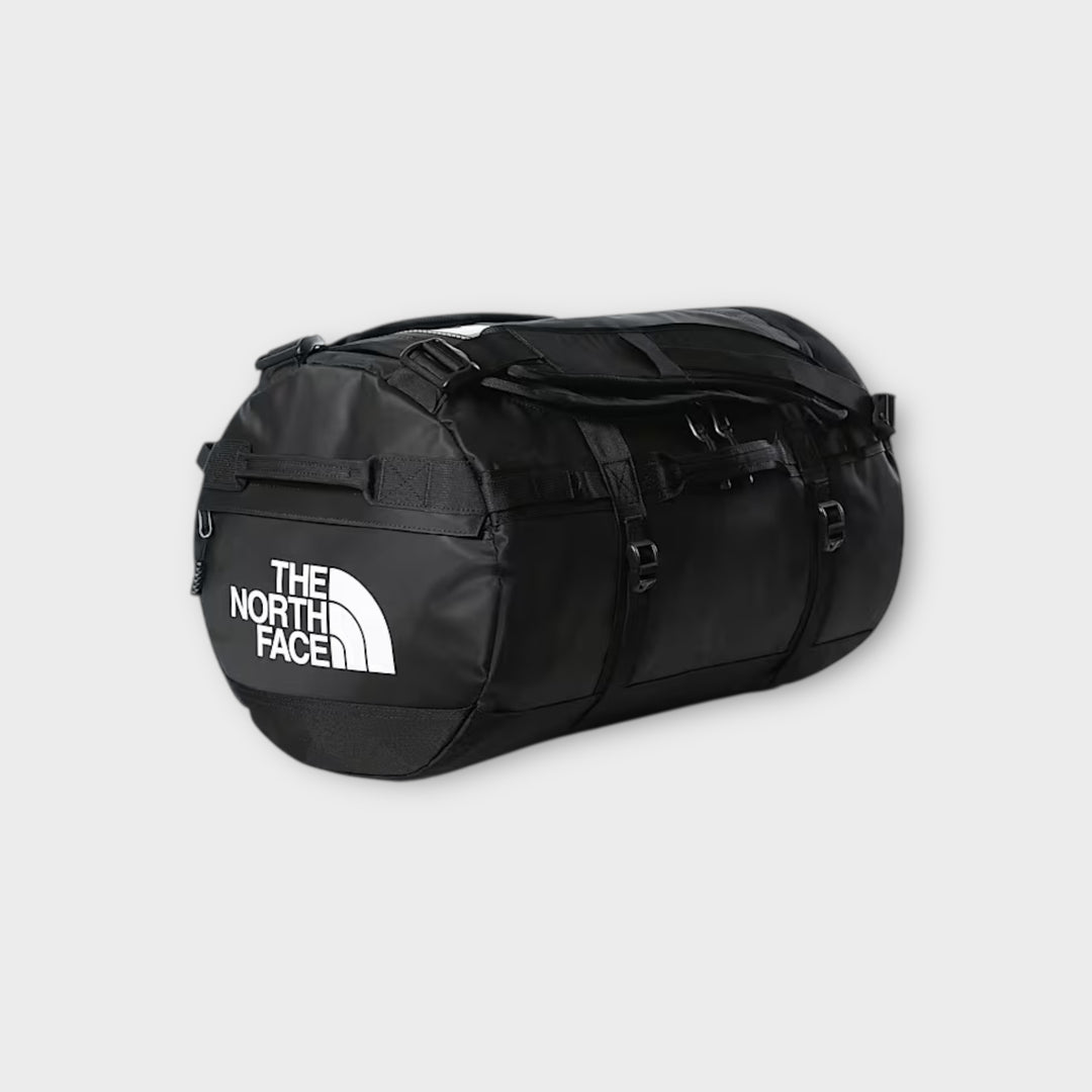 The North Face Base Camp 50L Small Duffel Bag i sort.