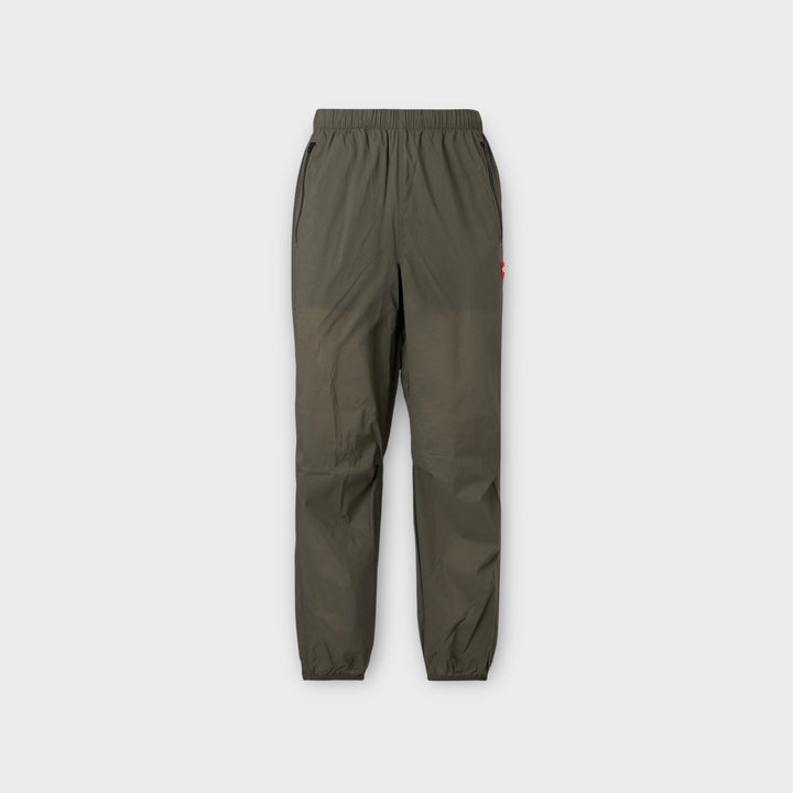 The North Face Wind Pants i Taupe Green.