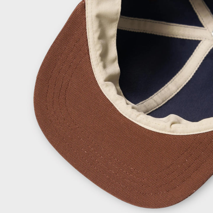 Universal Works Baseball Hat i Ecru/Navy set bagfra